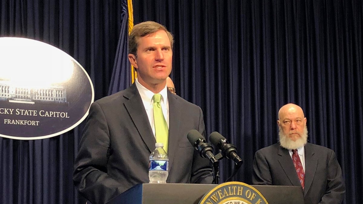 FILE - In this March 13, 2020 file photo, Kentucky Gov. Andy Beshear discusses developments in...