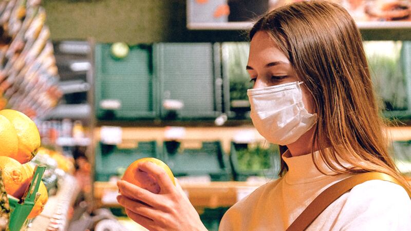 The CDC relaxed its guidance in April on wearing masks outdoors but still advises both...