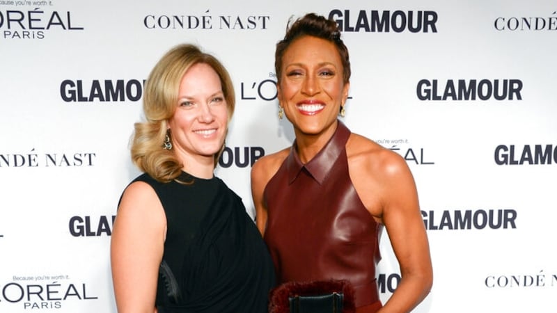 Robin Roberts and girlfriend Amber Laign attend the 2014 Glamour Women of the Year Awards at...