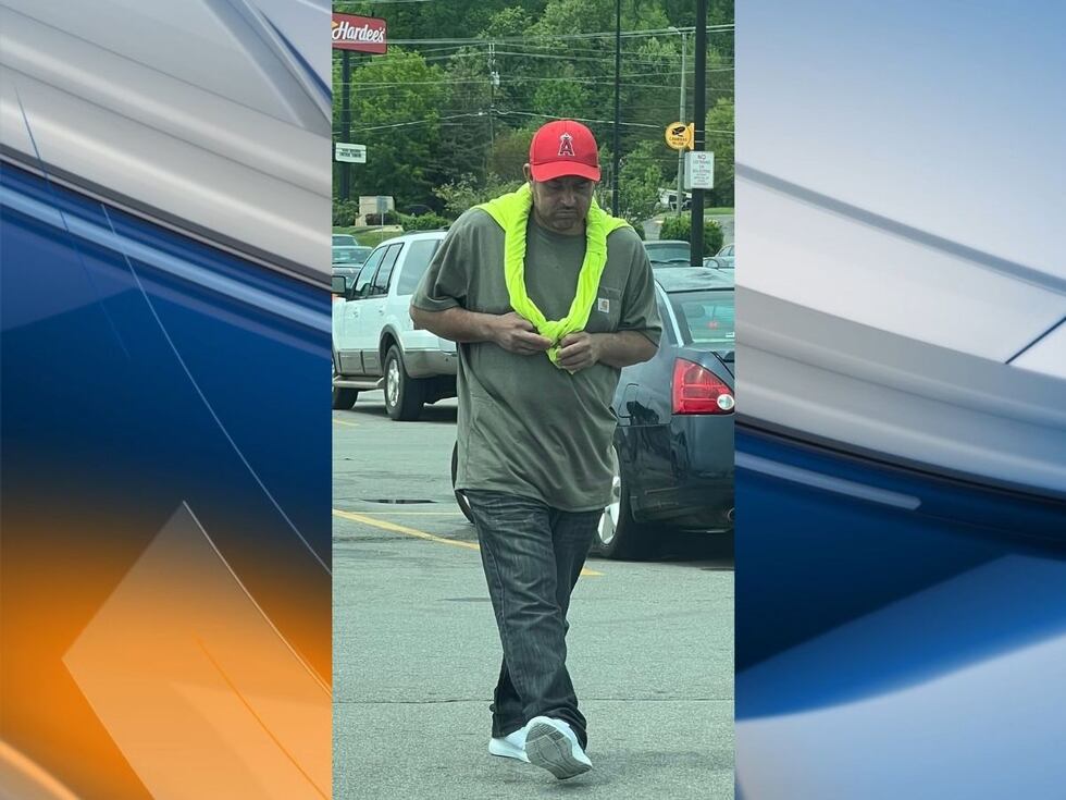 The woman took a photo of a man who reportedly approached her car and began to harass her,...