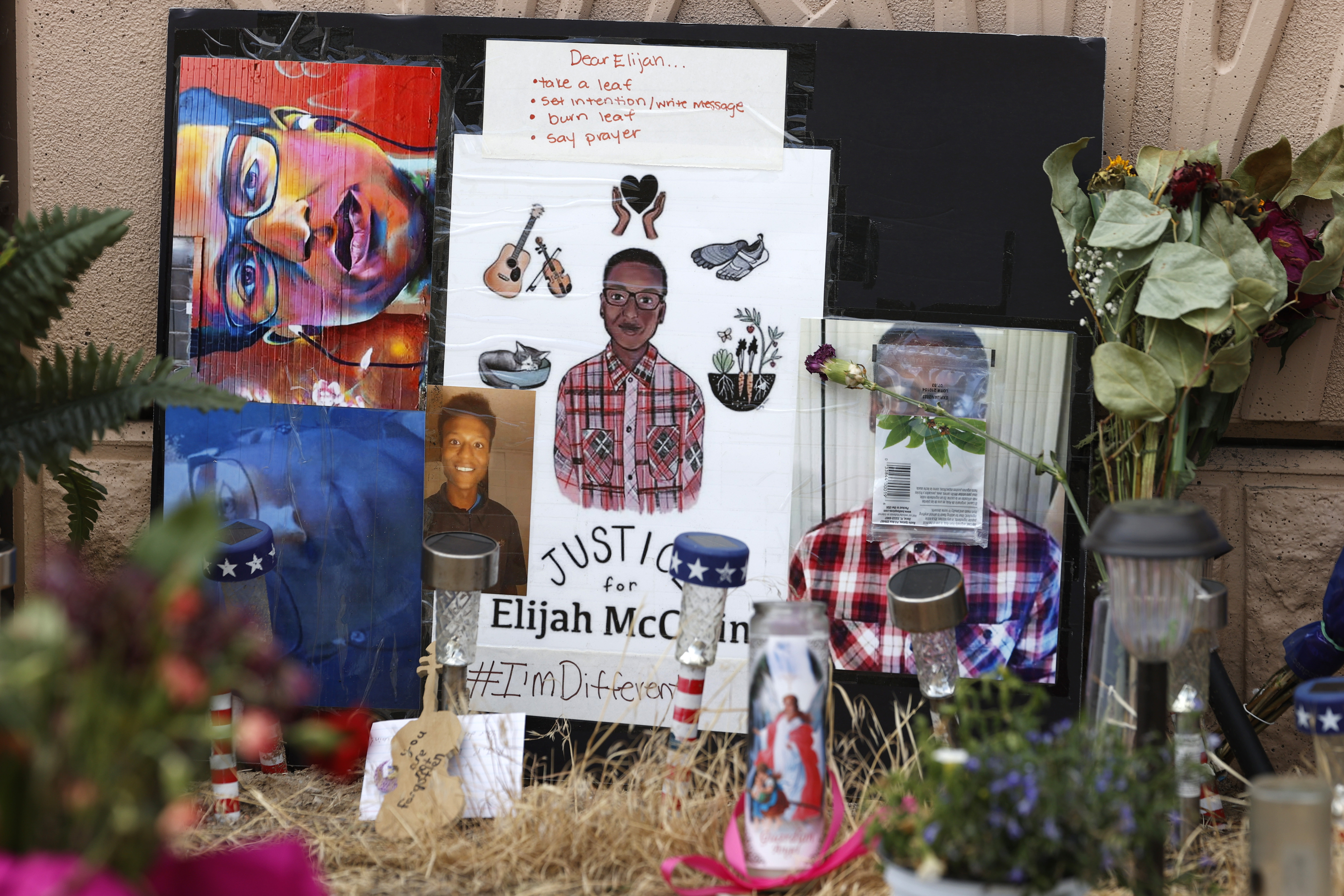 FILE - A makeshift memorial stands at a site across the street from where Elijah McClain was...